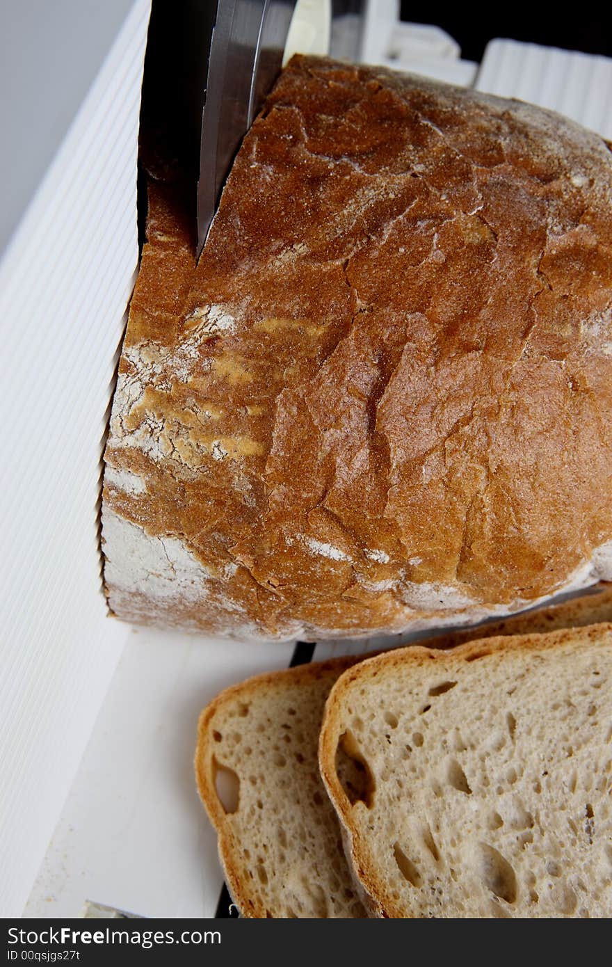 Cutter of bread in the kitchen. Cutter of bread in the kitchen