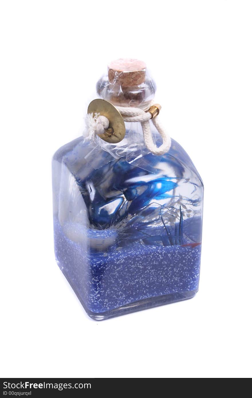 Bottle with blue oil on the white background. Bottle with blue oil on the white background