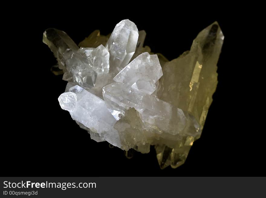 Rock crystal in front of a black background. Rock crystal in front of a black background