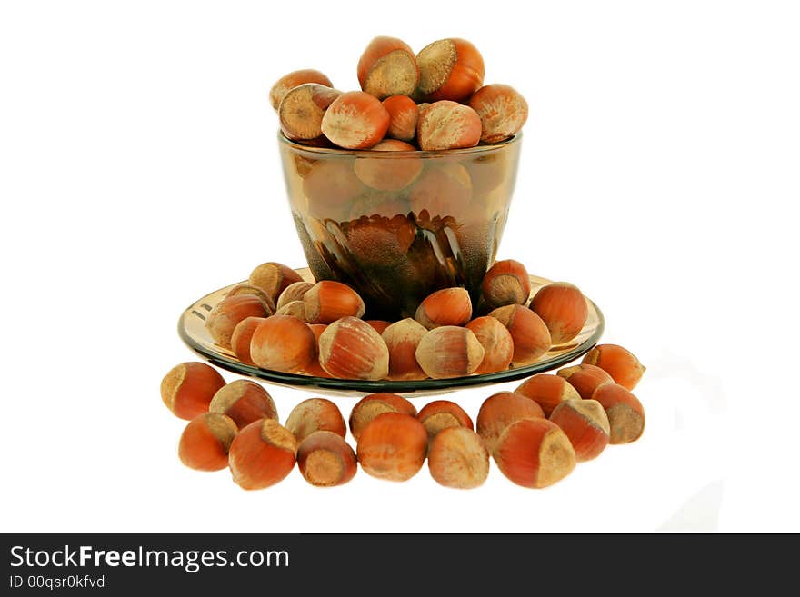 Isolated Nuts a filbert In a cup On a plate