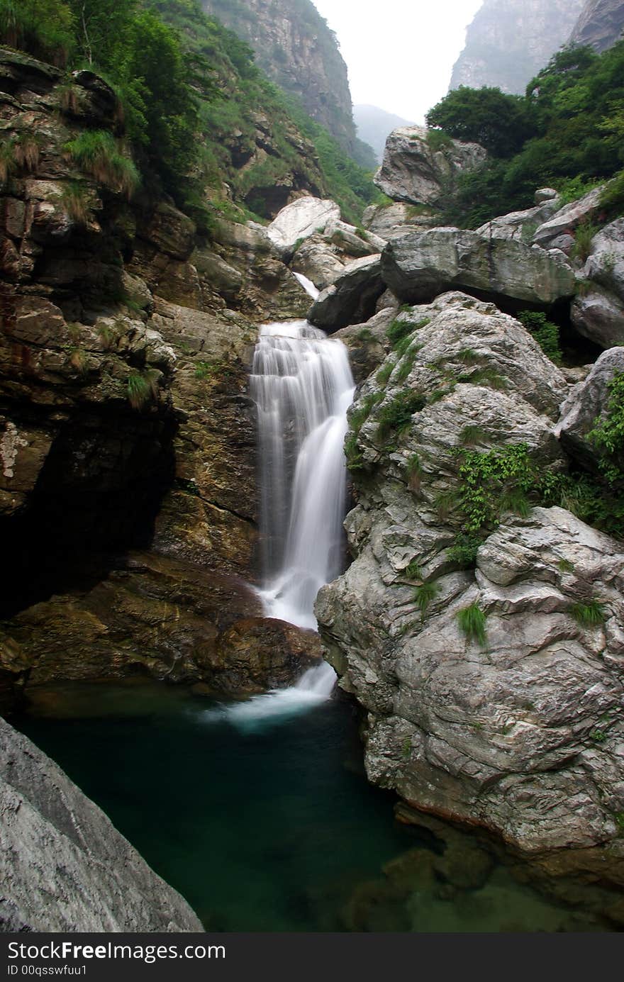 In the forest, the beautiful waterfall