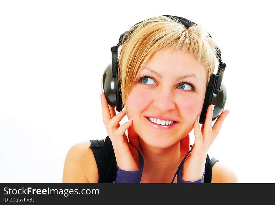 Woman in head phones on white