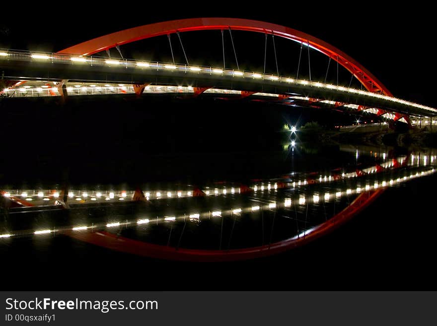 It is a bridge in the night time.