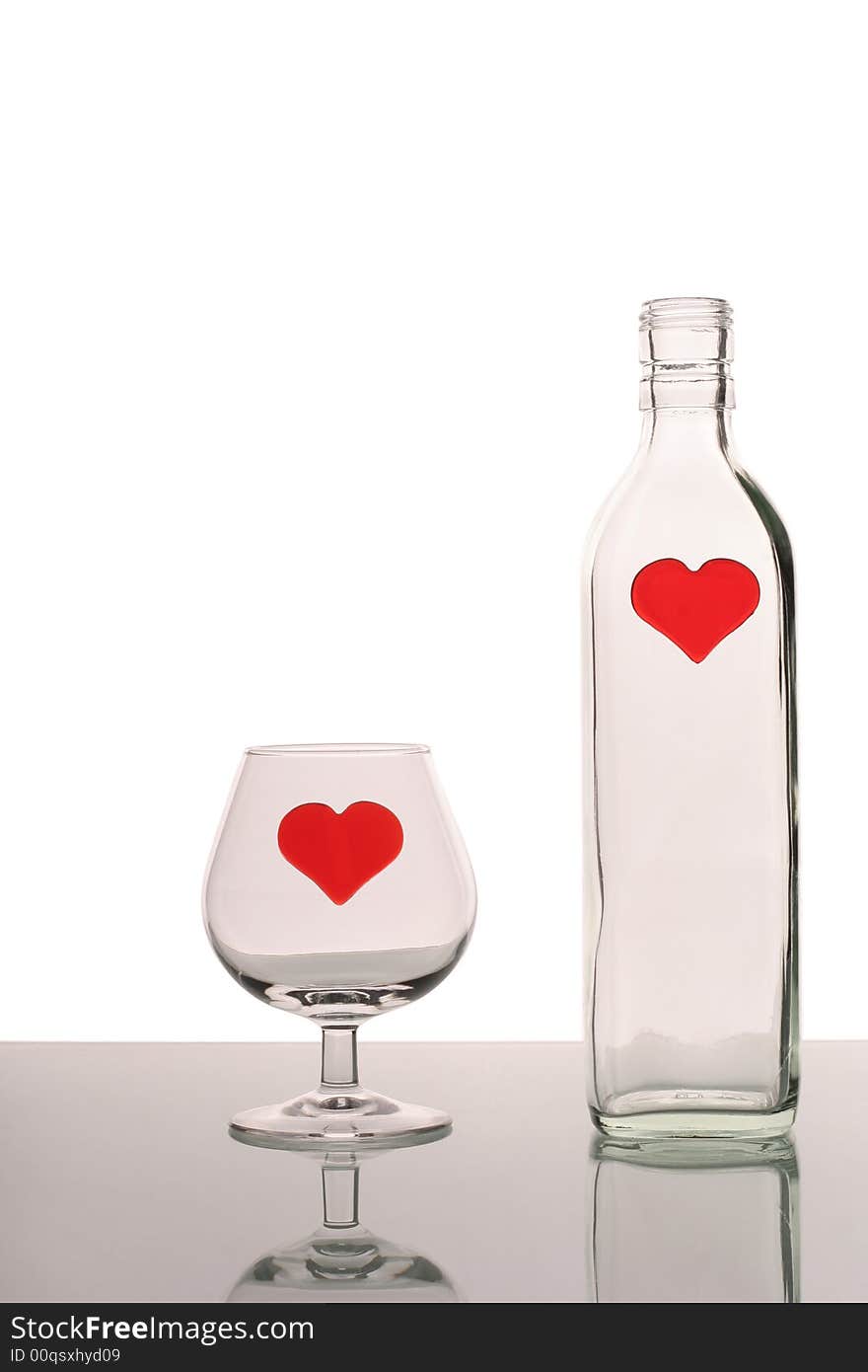 Bottle and glass with hearts