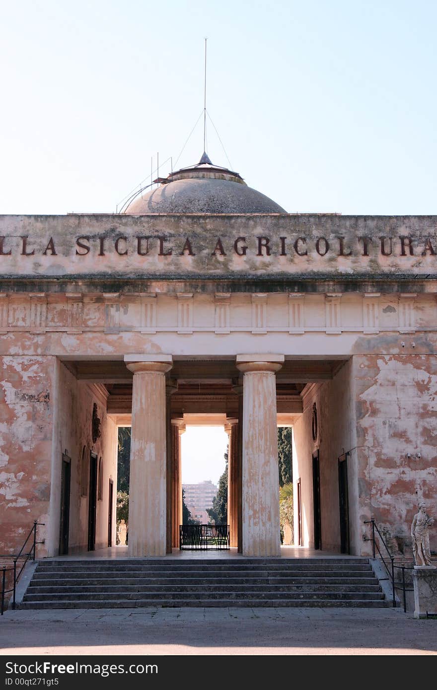 Ancient patrician villa in Palermo. Villa Bordonaro entrance columns and facade. Sicily. Italy. Ancient patrician villa in Palermo. Villa Bordonaro entrance columns and facade. Sicily. Italy