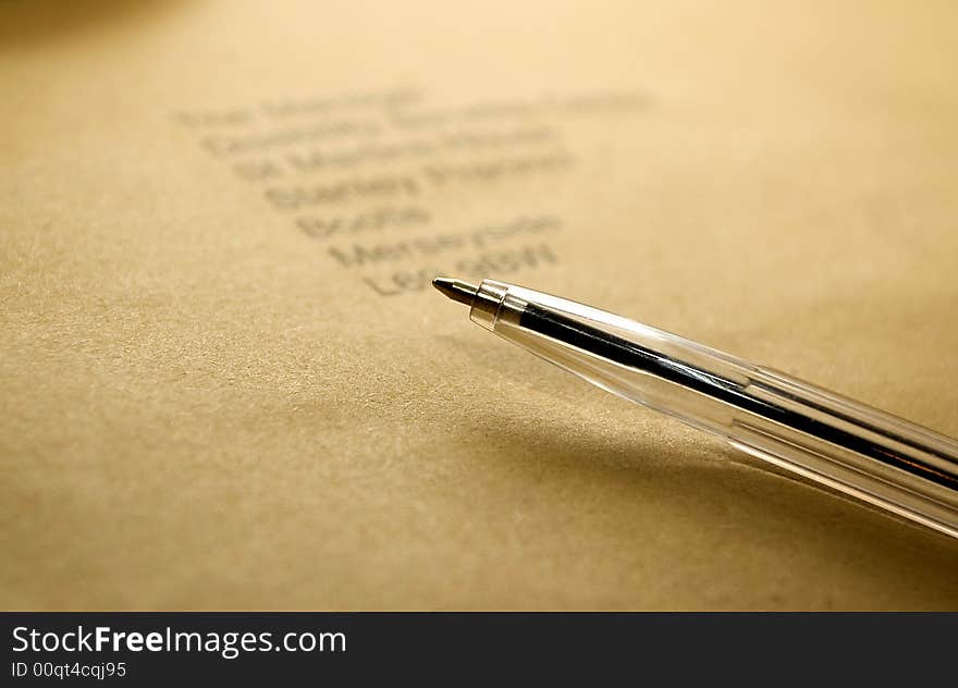 Macro of a pen lying on a envelope. Macro of a pen lying on a envelope