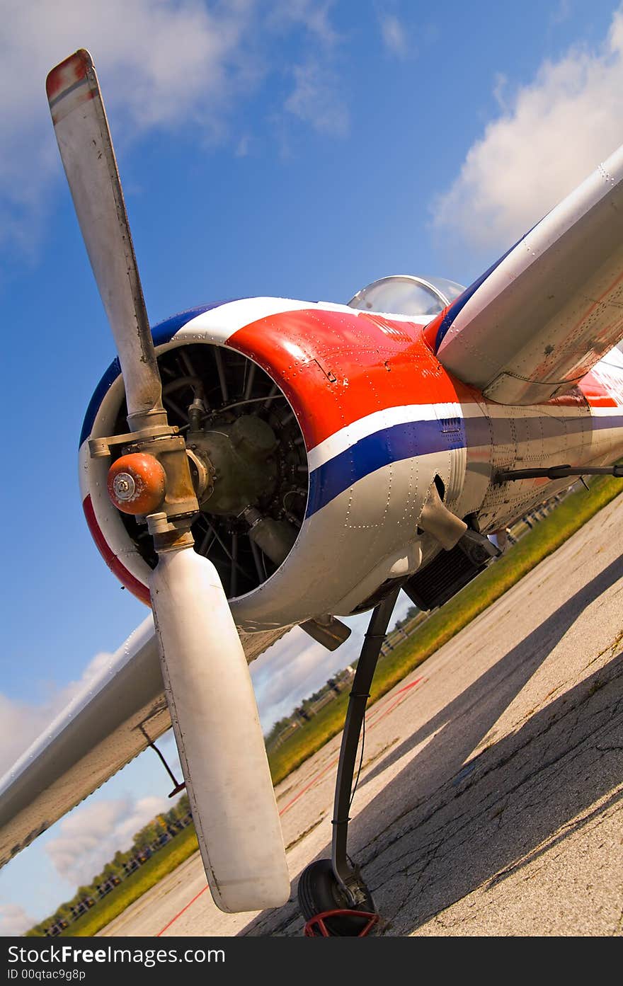 Front of light aircraft staying on the field. Front of light aircraft staying on the field