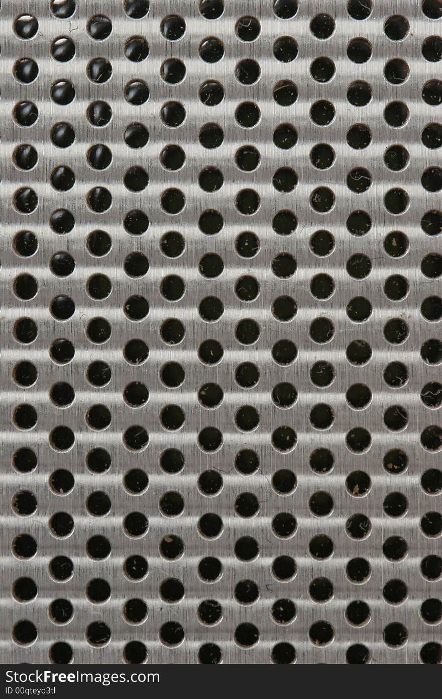 Metal background with circle holes