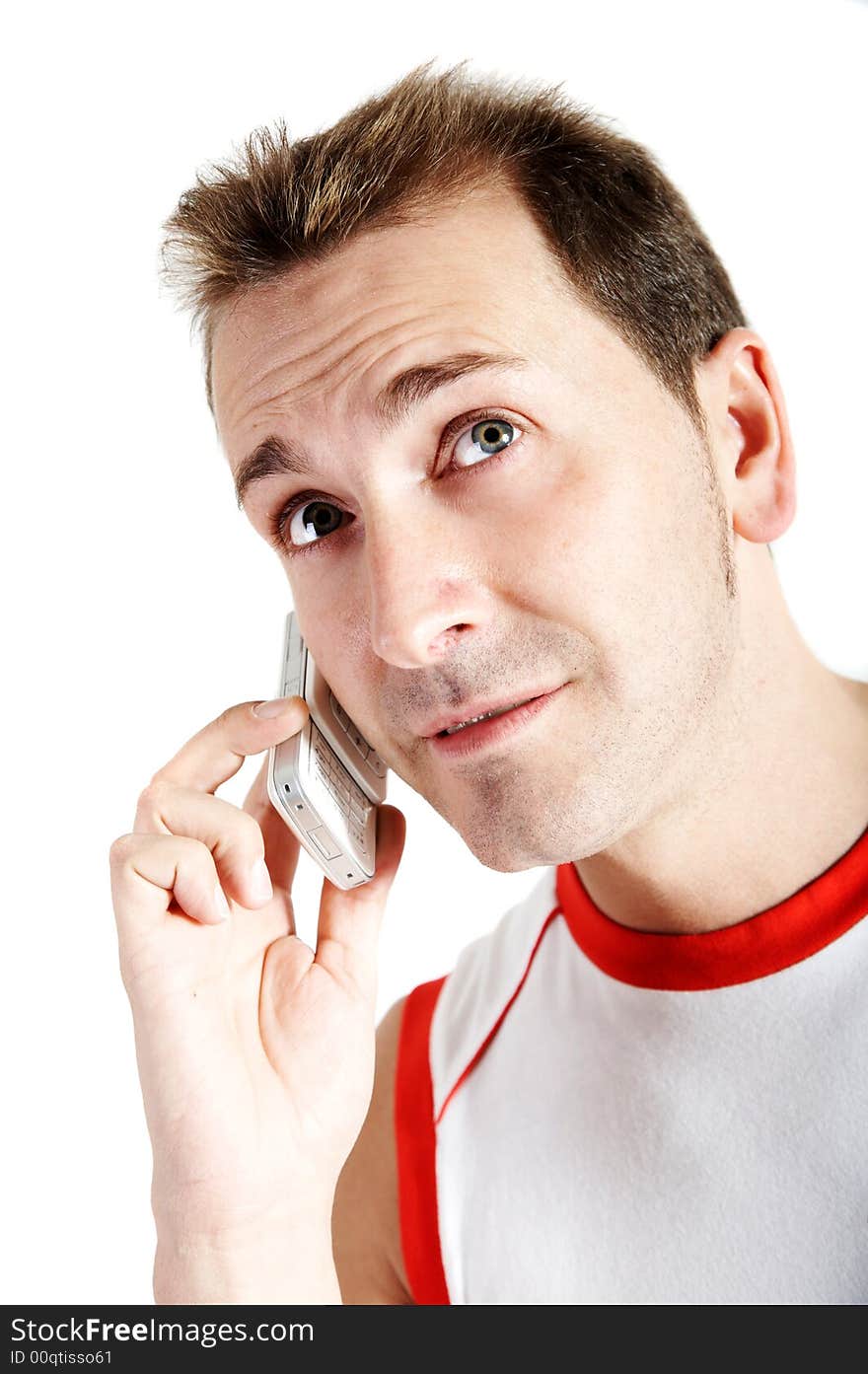 Casual man speaking with a cell phone. Casual man speaking with a cell phone