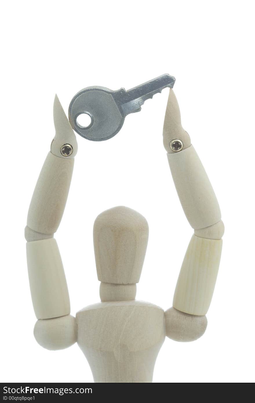 Manikin holds key in hands high up. Manikin holds key in hands high up