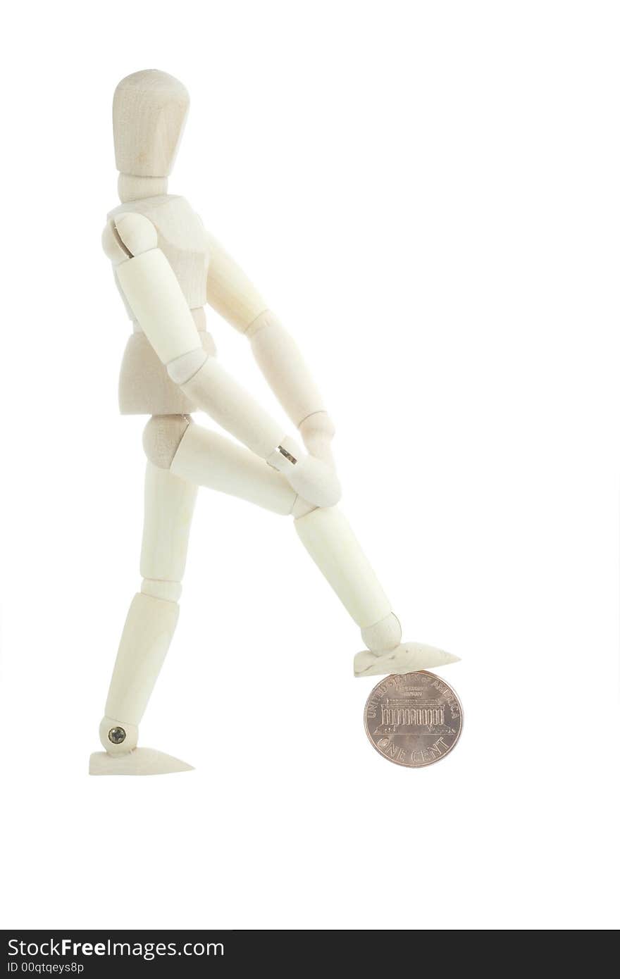 Manikin Standing On A Coin