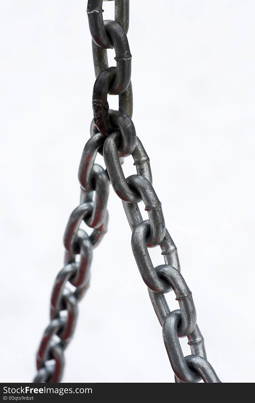 Grey chains of a children's swing