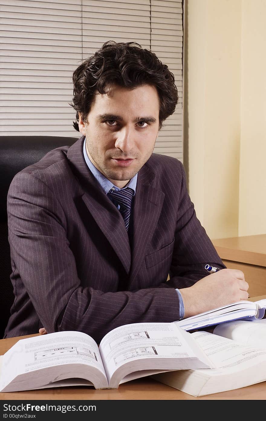 Business man at office at his desk