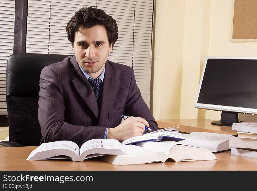 Business man at office at his desk