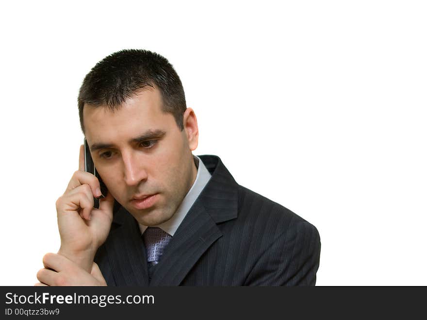 Young man talking on a phone, isolated on white background. Young man talking on a phone, isolated on white background