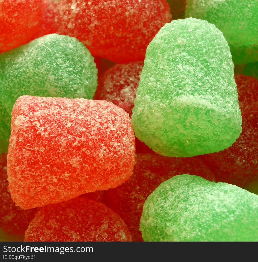 Background formed by a macro on sugar coated jujubes. Background formed by a macro on sugar coated jujubes