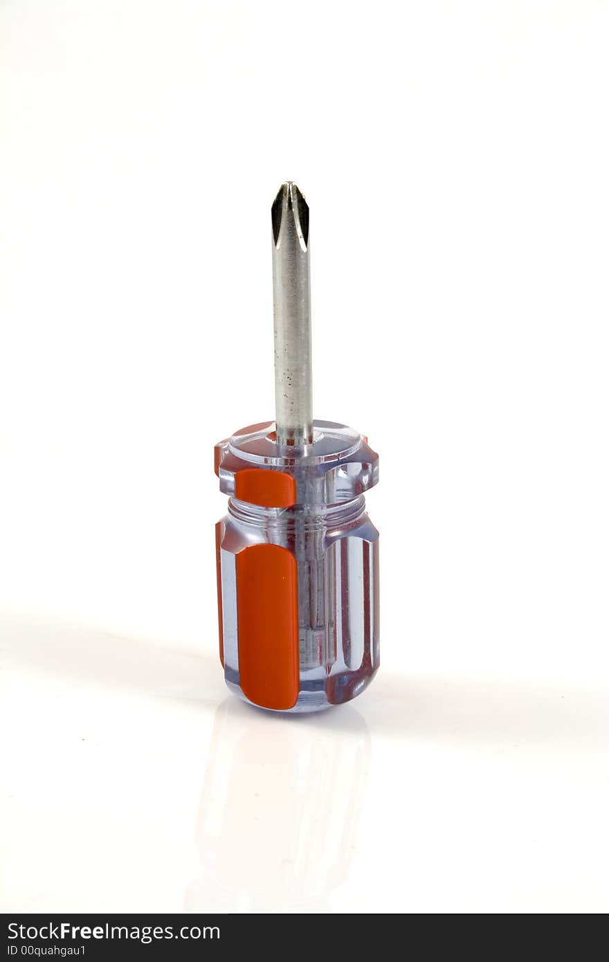 Red screwdriver isolated on the white background with shadow