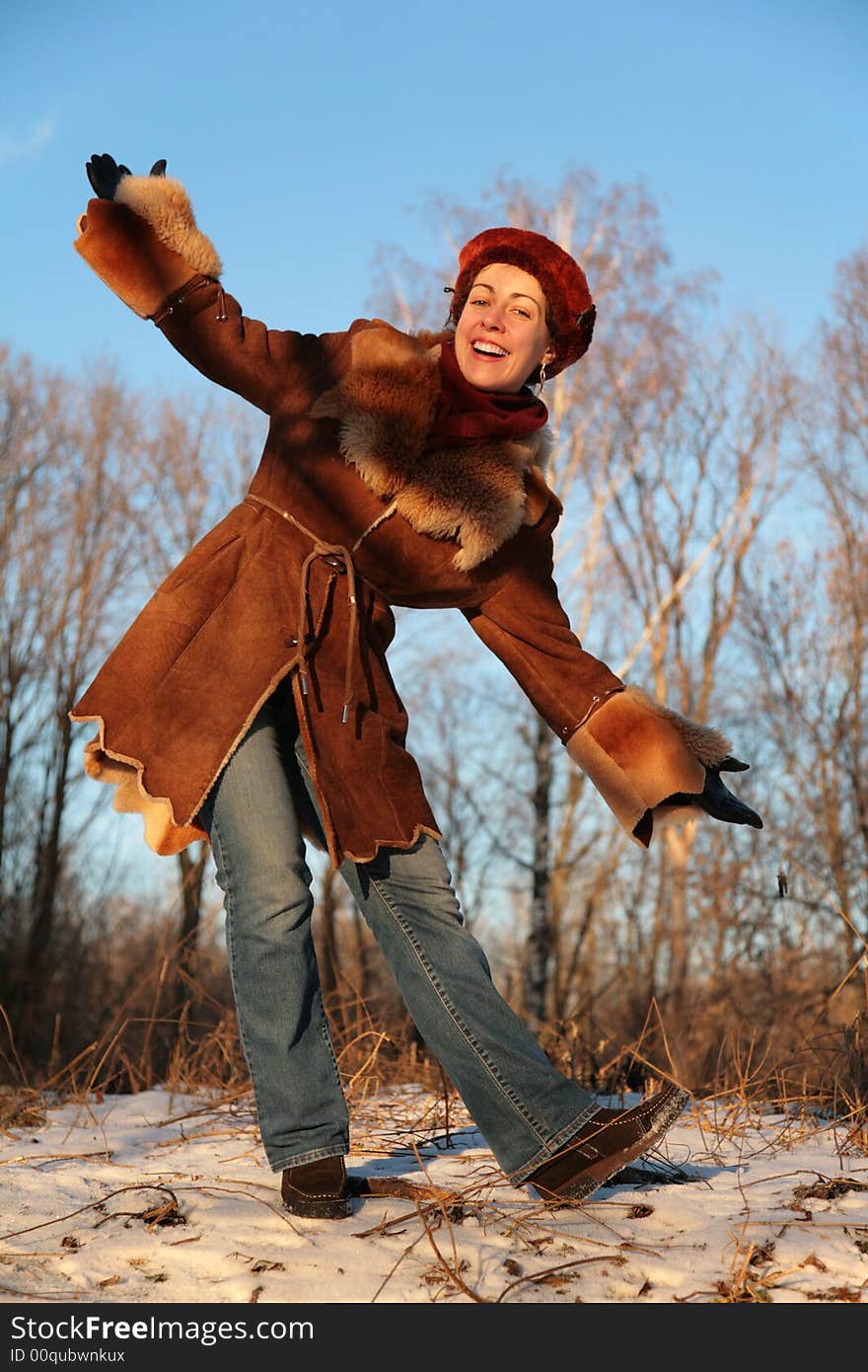 Young pretty woman posing outdoor in winter