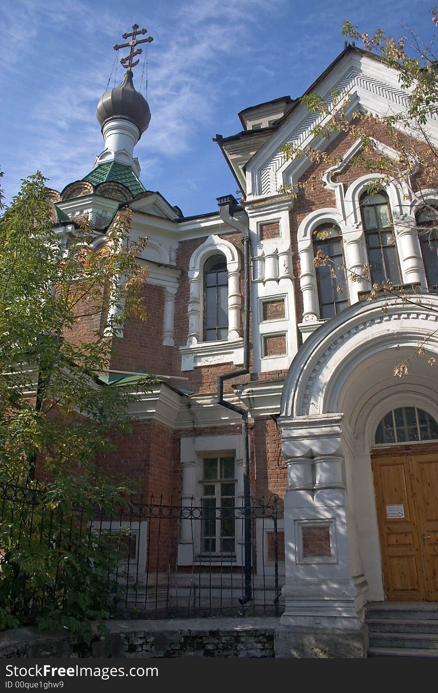 On a background of the light-blue sky church with domes. On a background of the light-blue sky church with domes.