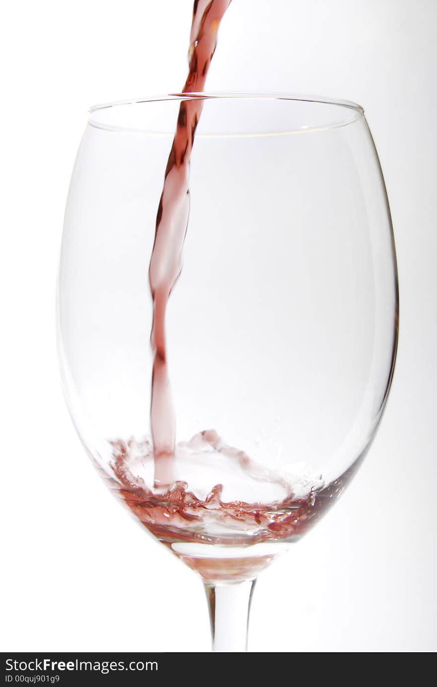 Red vine pouring in a glass. Red vine pouring in a glass