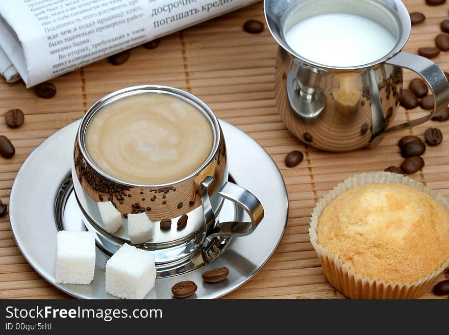 Cup of coffee with muffin and milk, coffee series