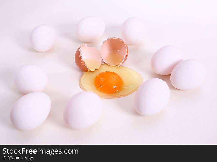 White and brown eggs on the table