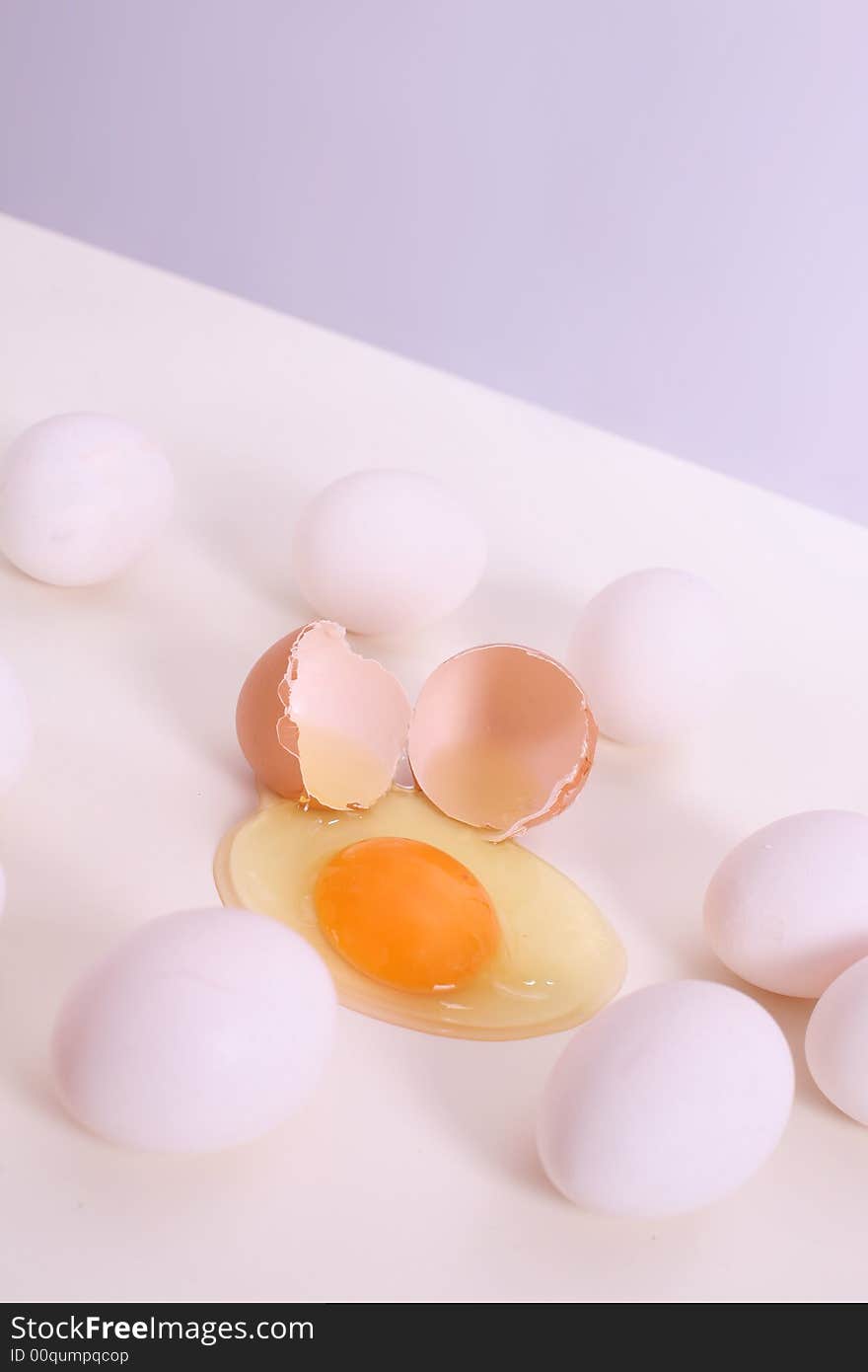 White and brown eggs on the table