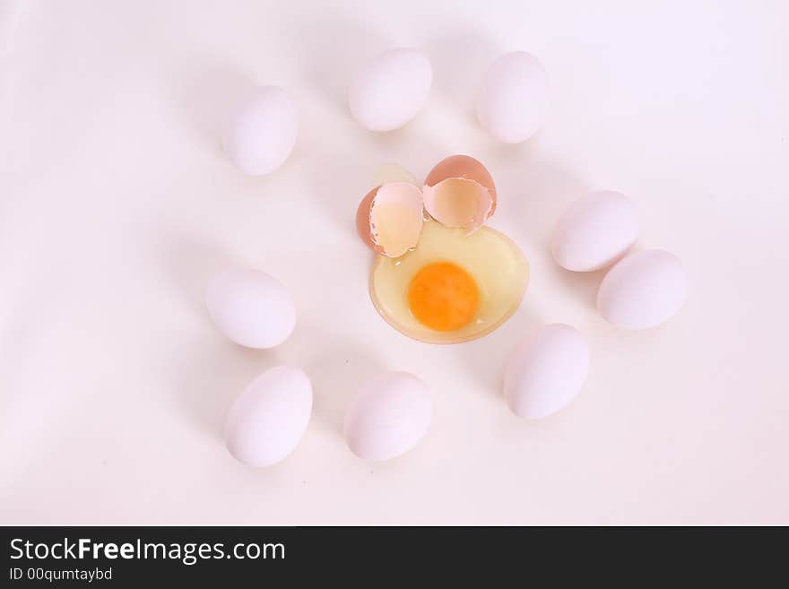 White and brown eggs on the table