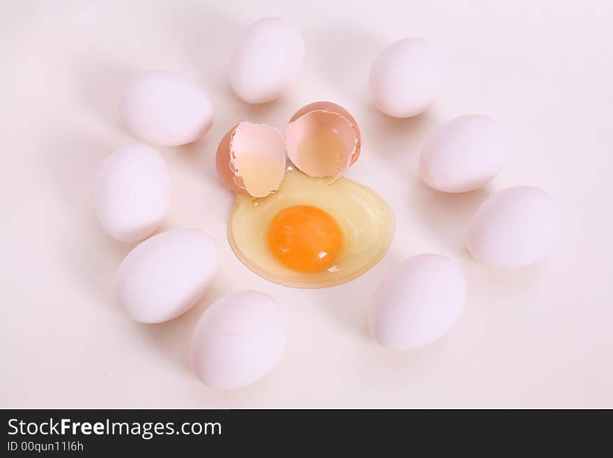 White and brown eggs on the table