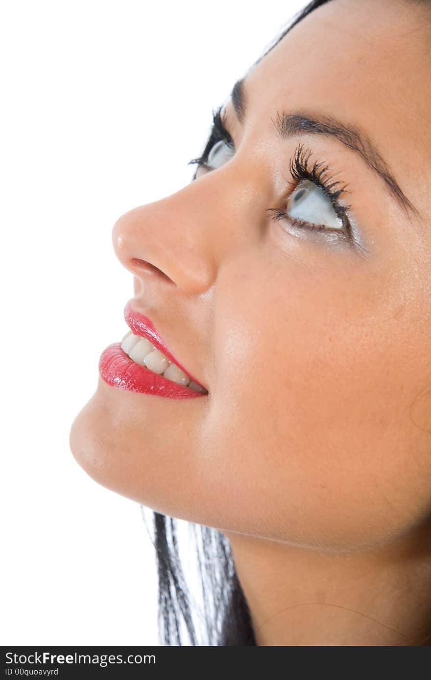 Portrait of the brunette with blue eye on insulated background