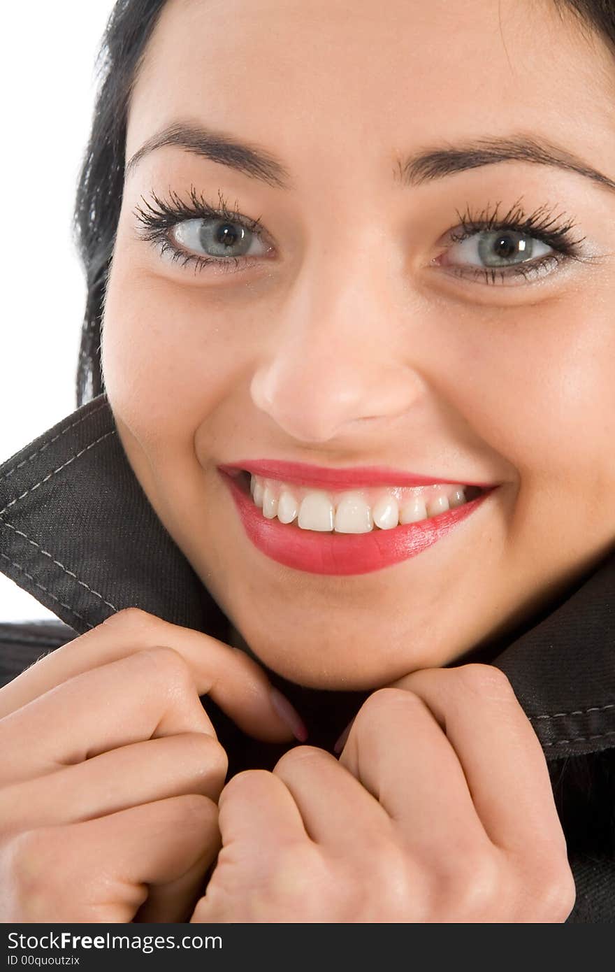 Portrait of the brunette with blue eye on white background