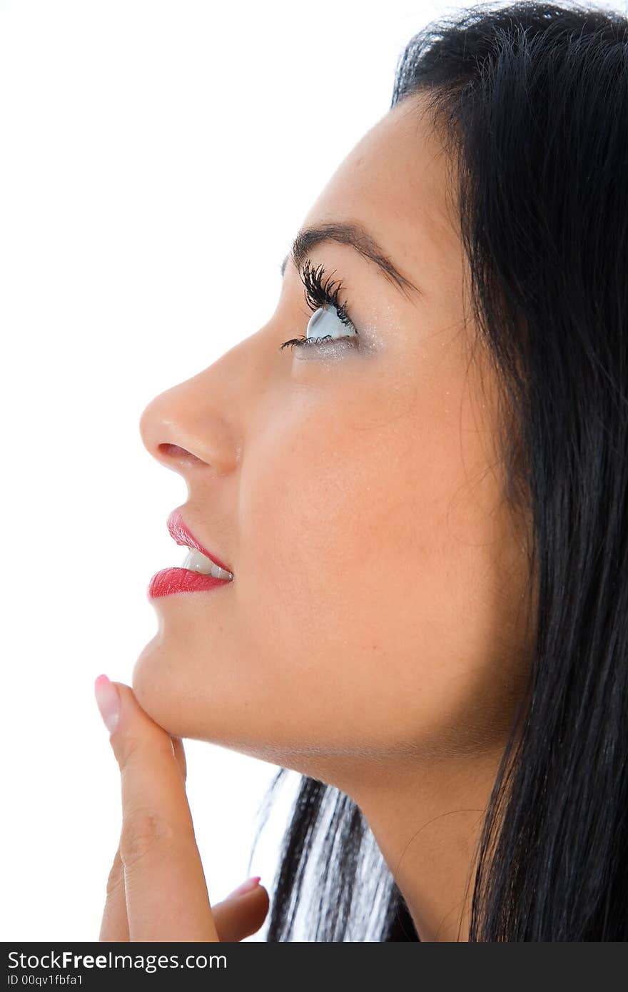 Portrait of the brunette with blue eye on insulated background