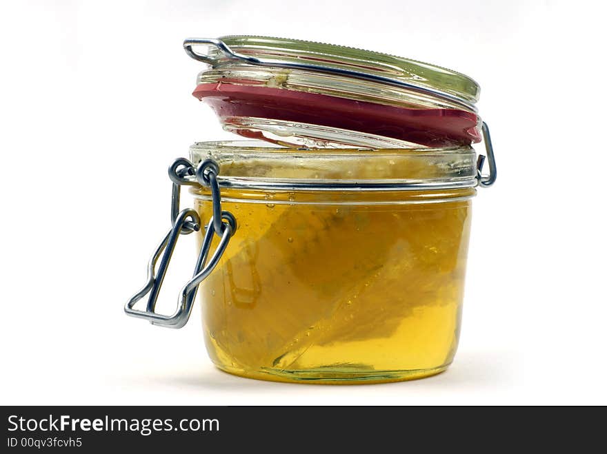 Honey and honeycomb in open jar