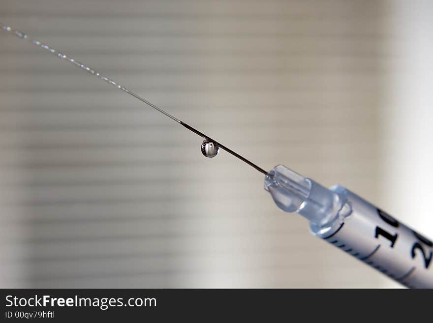 Jet of a liquid from a syringe for insulin