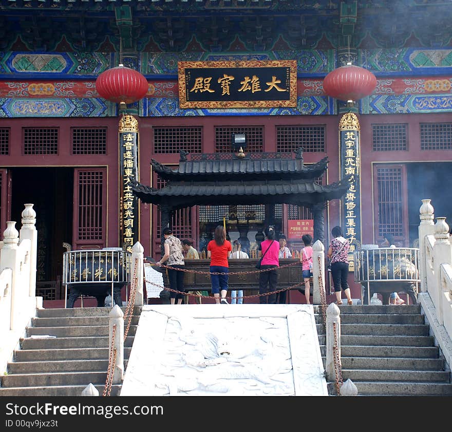 Praying Before Buddha