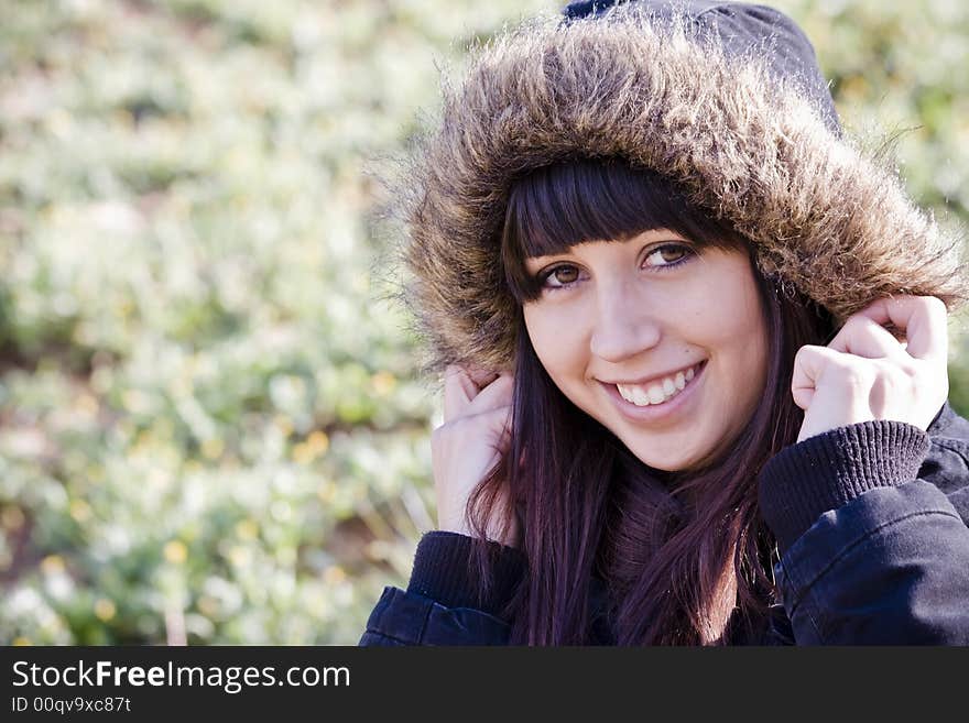 Smiling girl in autumn fashion