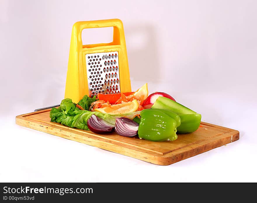 Preparing salad on the wood and in studio