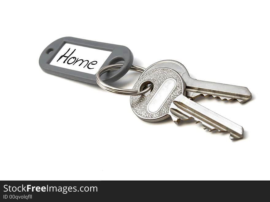 Key with home tag. Isolated on white background. Key with home tag. Isolated on white background.