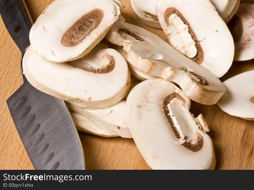 Fresh mushrooms on a cutting board healthy. Fresh mushrooms on a cutting board healthy