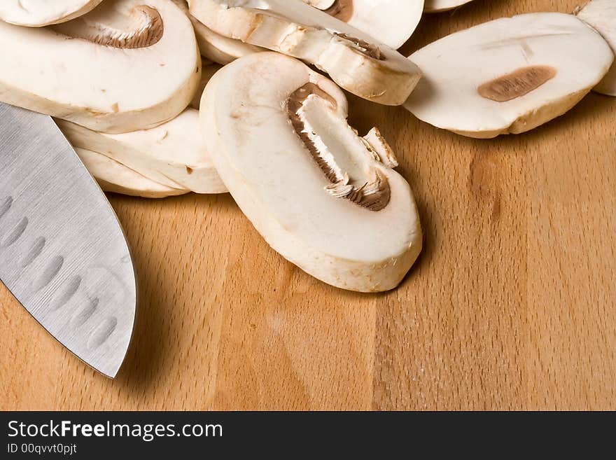 Fresh mushrooms on a cutting board healthy. Fresh mushrooms on a cutting board healthy