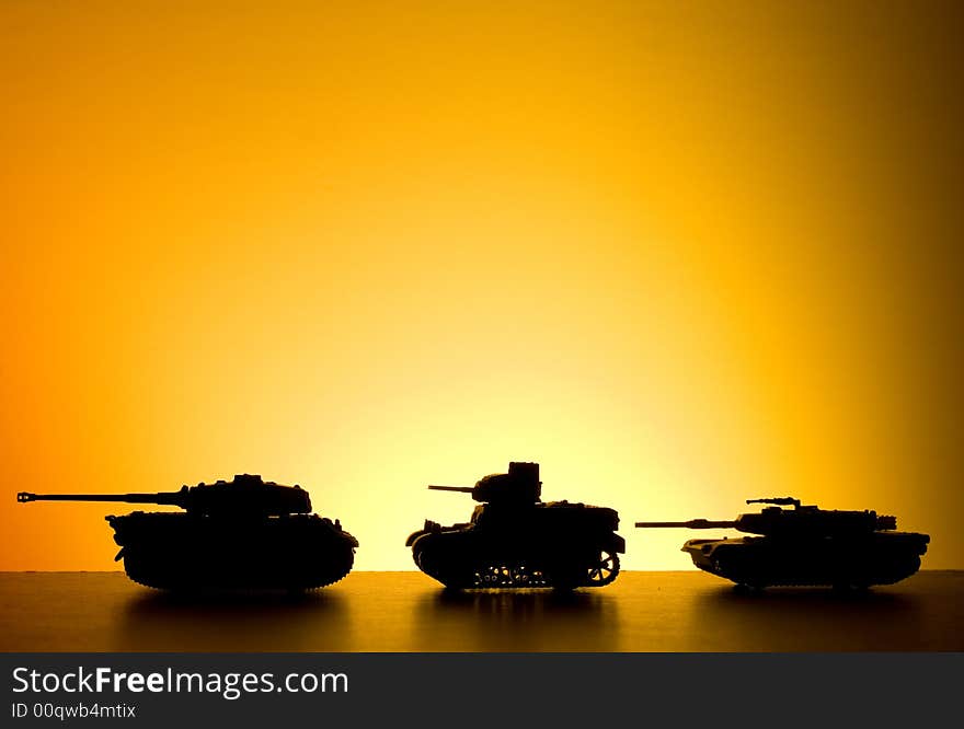 Battle tank on sunset