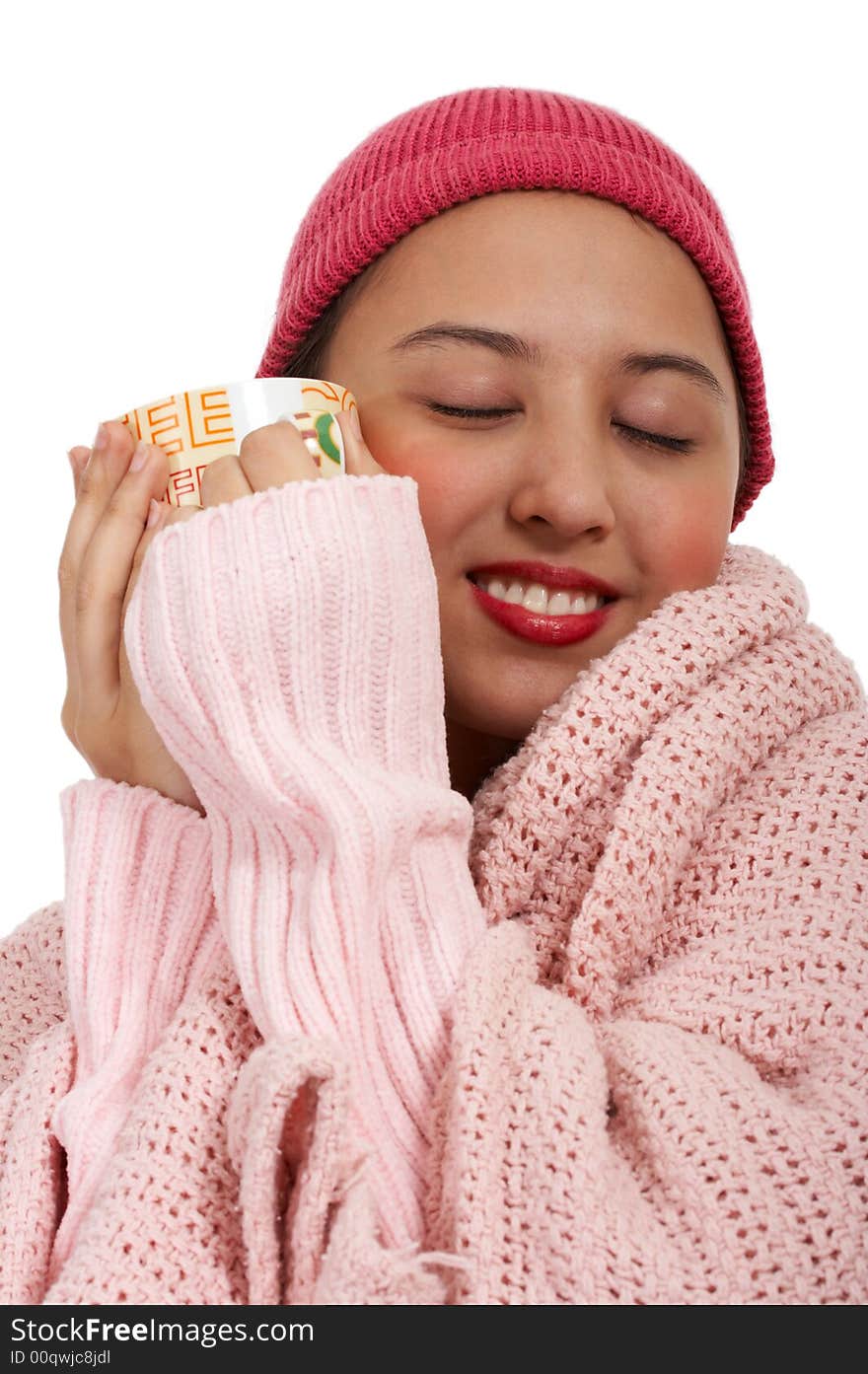 Freezing lady trying to get warm from a cup of coffee. Freezing lady trying to get warm from a cup of coffee