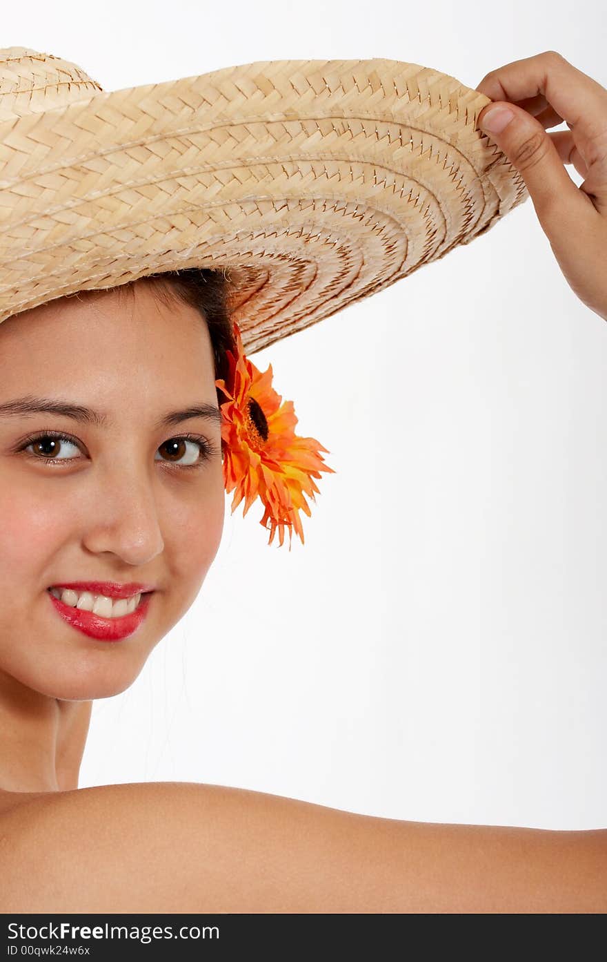 Attractive pretty girl wearing a summer hat