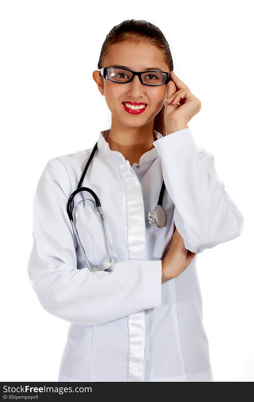 Female doctor smiling while holding her eyeglasses