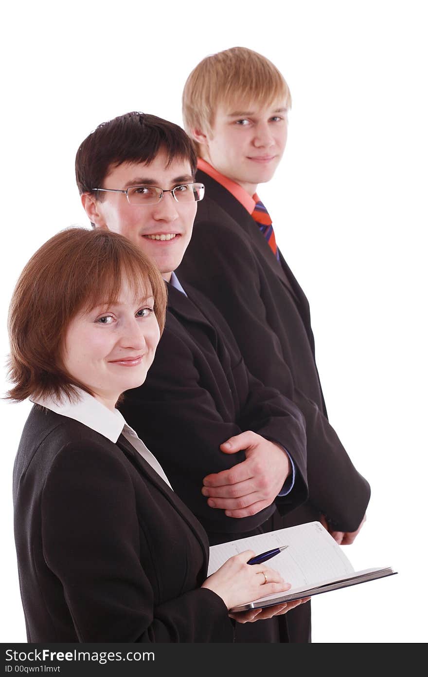 Group of business people working together. Shot in studio. Group of business people working together. Shot in studio.