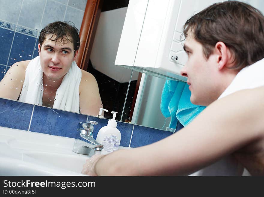 Morning background: a man in a bathroom. Morning background: a man in a bathroom