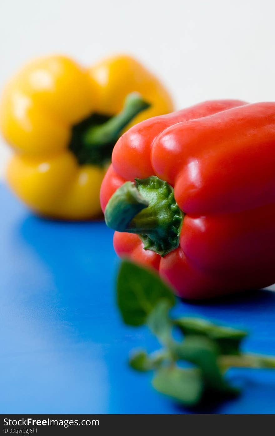 Capsicums on the blue background. Capsicums on the blue background