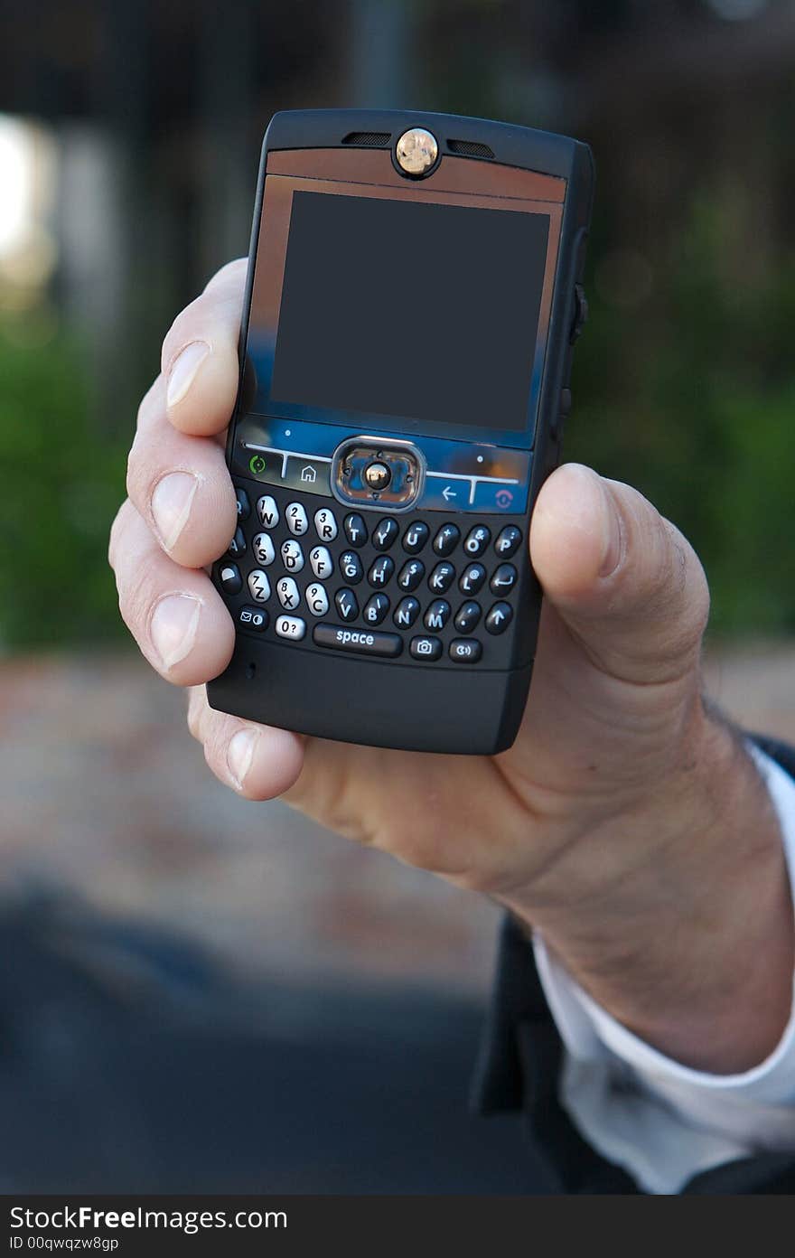 Modern mobile cell phone being held with blank screen