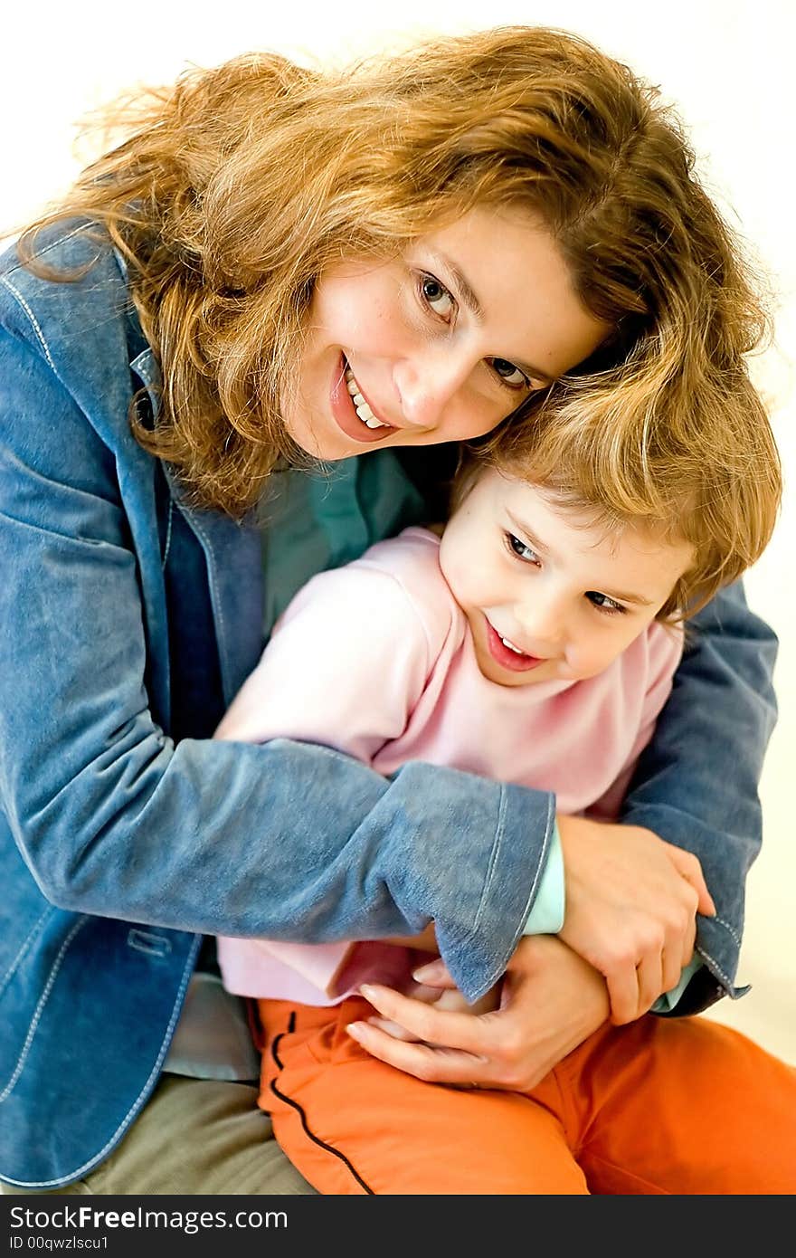 Smiling mother and small daughter. Smiling mother and small daughter