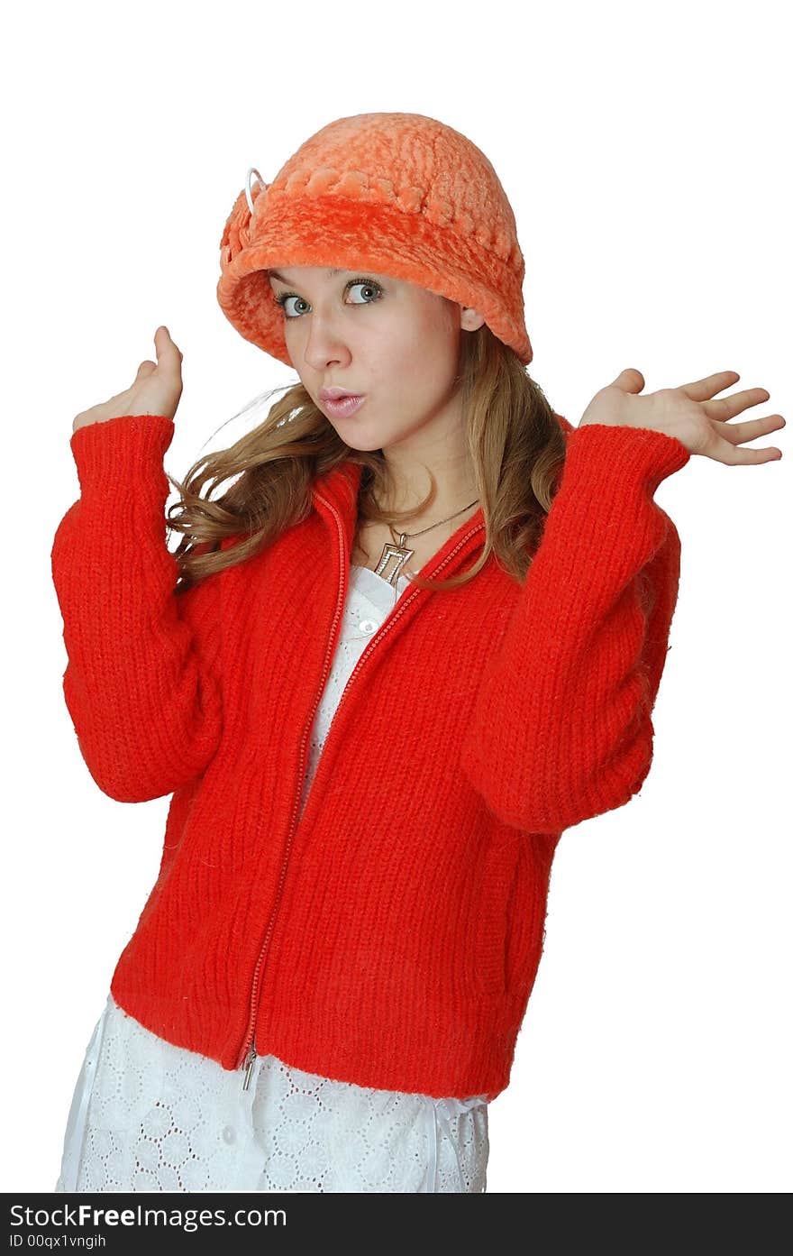 Girl in orange cap and red sweater stay with hands up